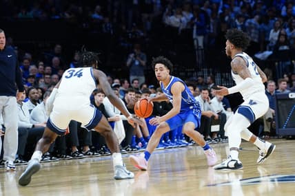 Feb 25, 2023; Philadelphia, Pennsylvania, USA; Creighton Bluejays guard Ryan Nembhard (2) dribbles the ball against Villanova Wildcats forward Brandon Slater (34) an d  forward Cam Whitmore (22) during the first half at Wells Fargo Center. Mandatory Credit: Gregory Fisher-USA TODAY Sports