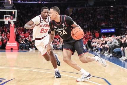 Feb 25, 2023; New York, New York, USA; Connecticut Huskies guard Jordan Hawkins (24) looks to drive past St. John's Red Storm forward David Jones (23) in the first half at Madison Square Garden. Mandatory Credit: Wendell Cruz-USA TODAY Sports