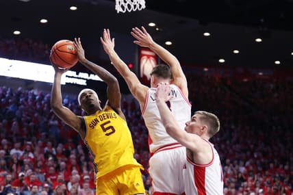 Feb 25, 2023; Tucson, Arizona, USA; Arizona State Sun Devils forward Jamiya Neal (5) shoots the ball against Arizona Wildcats guard Pelle Larsson (3) and forward Azuolas Tubelis (10) in the first half at McKale Center. Mandatory Credit: Zachary BonDurant-USA TODAY Sports