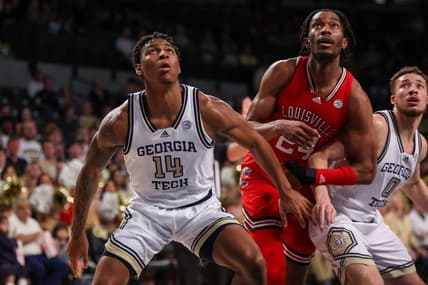 Feb 25, 2023; Atlanta, Georgia, USA; Georgia Tech Yellow Jackets forward Jalon Moore (14) boxes out Louisville Cardinals forward Jae'Lyn Withers (24) in the first half at McCamish Pavilion. Mandatory Credit: Brett Davis-USA TODAY Sports