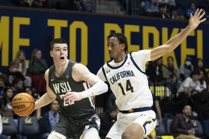 February 25, 2023; Berkeley, California, USA; Washington State Cougars forward Andrej Jakimovski (23) dribbles the basketball against California Golden Bears forward Grant Newell (14) during the first half at Haas Pavilion. Mandatory Credit: Kyle Terada-USA TODAY Sports