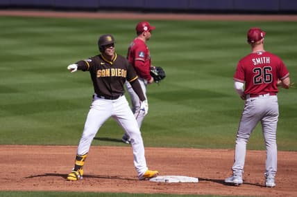 Feb 26, 2023; Peoria, Arizona, USA; San Diego Padres right fielder Juan Soto (22) celebrates a double against the Arizona Diamondbacks during the second inning at Peoria Sports Complex. Mandatory Credit: Joe Camporeale-USA TODAY Sports