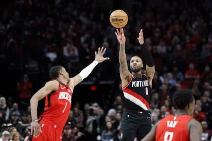 Feb 26, 2023; Portland, Oregon, USA; Portland Trail Blazers point guard Damian Lillard (0) shoots the ball over Houston Rockets power forward Jabari Smith Jr. (1) during the second half at Moda Center. Mandatory Credit: Soobum Im-USA TODAY Sports