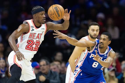 Feb 27, 2023; Philadelphia, Pennsylvania, USA; Philadelphia 76ers guard De'Anthony Melton (8) passes the ball past Miami Heat forward Jimmy Butler (22) during the first quarter at Wells Fargo Center. Mandatory Credit: Bill Streicher-USA TODAY Sports