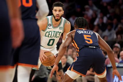 Feb 27, 2023; New York, New York, USA; Boston Celtics forward Jayson Tatum (0) controls the ball against New York Knicks guard Immanuel Quickley (5) during the second quarter at Madison Square Garden. Mandatory Credit: Brad Penner-USA TODAY Sports