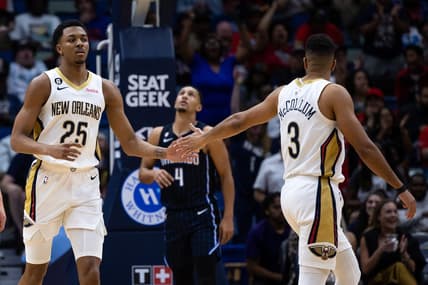 Feb 27, 2023; New Orleans, Louisiana, USA;  New Orleans Pelicans guard Trey Murphy III (25) reacts to making a three point basket with guard CJ McCollum (3) against the Orlando Magic during the first half at Smoothie King Center. Mandatory Credit: Stephen Lew-USA TODAY Sports