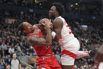 Feb 28, 2023; Toronto, Ontario, CAN; Chicago Bulls forward DeMar DeRozan (11) and Toronto Raptors forward O.G. Anunoby (3) battle for the ball during the first half at Scotiabank Arena. Mandatory Credit: John E. Sokolowski-USA TODAY Sports