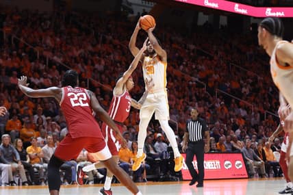 Feb 28, 2023; Knoxville, Tennessee, USA; Tennessee Volunteers guard Josiah-Jordan James (30) shoots the ball against the Arkansas Razorbacks during the first half at Thompson-Boling Arena. Mandatory Credit: Randy Sartin-USA TODAY Sports
