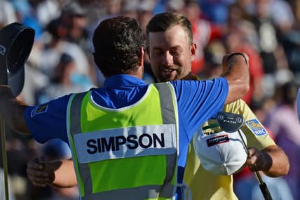 Feb 2, 2020; Scottsdale, Arizona, USA; Webb Simpson hugs his caddie Paul Tesori after winning the Waste Management Phoenix Open golf tournament at TPC Scottsdale. Mandatory Credit: Joe Camporeale-USA TODAY Sports