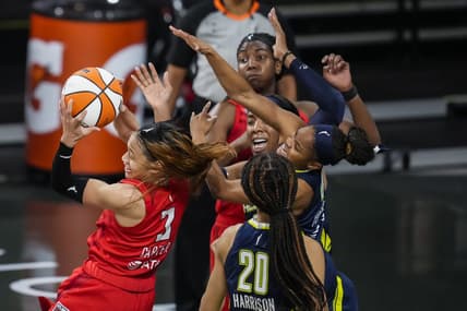 May 27, 2021; College Park, Georgia, USA; Atlanta Dream guard Chennedy Carter (3) comes away with a rebound against the Dallas Wings during the second half at Gateway Center Arena at College Park. Mandatory Credit: Dale Zanine-USA TODAY Sports