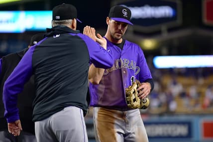 October 3, 2022; Los Angeles, California, USA; Colorado Rockies manager Bud Black (10) and left fielder Sean Bouchard (12) celebrate the victory against the Los Angeles Dodgers at Dodger Stadium. Mandatory Credit: Gary A. Vasquez-USA TODAY Sports