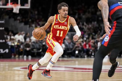 Dec 23, 2022; Atlanta, Georgia, USA; Atlanta Hawks guard Trae Young (11) dribbles the ball against the Detroit Pistons during the second half at State Farm Arena. Mandatory Credit: Dale Zanine-USA TODAY Sports