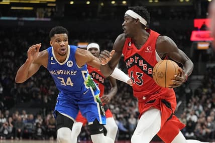 Jan 4, 2023; Toronto, Ontario, CAN; Toronto Raptors forward Pascal Siakam (43) drives to the net against Milwaukee Bucks forward Giannis Antetokounmpo (34) during the first half at Scotiabank Arena. Mandatory Credit: John E. Sokolowski-USA TODAY Sports