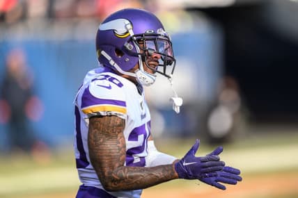 Jan 8, 2023; Chicago, Illinois, USA; Minnesota Vikings cornerback Duke Shelley (20) celebrates a defensive pass break up during the third quarter against the Chicago Bears at Soldier Field. Mandatory Credit: Daniel Bartel-USA TODAY Sports