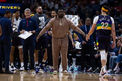 Jan 18, 2023; New Orleans, Louisiana, USA; New Orleans Pelicans forward Zion Williamson (1) meets his teammates during a time out against the Miami Heat during the first half at Smoothie King Center. Mandatory Credit: Stephen Lew-USA TODAY Sports