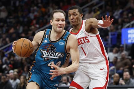 Jan 28, 2023; Detroit, Michigan, USA;  Detroit Pistons forward Bojan Bogdanovic (44) dribbles defended by Houston Rockets forward Jabari Smith Jr. (1) in the second half at Little Caesars Arena. Mandatory Credit: Rick Osentoski-USA TODAY Sports