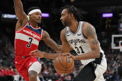 Jan 30, 2023; San Antonio, Texas, USA;  San Antonio Spurs forward Keita Bates-Diop (31) drives against Washington Wizards guard Bradley Beal (3) in the second half at the AT&T Center. Mandatory Credit: Daniel Dunn-USA TODAY Sports