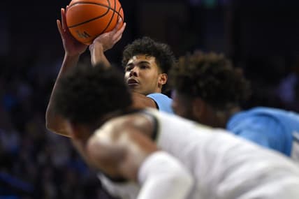 Feb 7, 2023; Winston-Salem, North Carolina, USA; North Carolina Tar Heels forward Puff Johnson (14) shoots a free throw during the second half at Lawrence Joel Veterans Memorial Coliseum. Mandatory Credit: William Howard-USA TODAY Sports