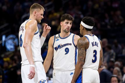Feb 13, 2023; San Francisco, California, USA; Washington Wizards center Kristaps Porzingis (6) and forward Deni Avdija (9) and guard Bradley Beal (3) talk during the second half of the game against the Golden State Warriors at Chase Center. Mandatory Credit: John Hefti-USA TODAY Sports