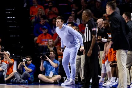 Feb 22, 2023; Gainesville, Florida, USA; Florida Gators forward Colin Castleton (12) cheers from the sideline during the first half against the Kentucky Wildcats at Exactech Arena at the Stephen C. O'Connell Center. Mandatory Credit: Matt Pendleton-USA TODAY Sports