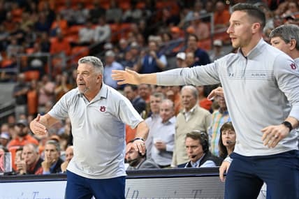 Feb 22, 2023; Auburn, Alabama, USA;  Auburn Tigers head coach Bruce Pearl (left) reacts during the second half against the Mississippi Rebels at Neville Arena. Mandatory Credit: Julie Bennett-USA TODAY Sports