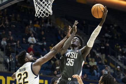 February 25, 2023; Berkeley, California, USA; Washington State Cougars forward Mouhamed Gueye (35) shoots the basketball against California Golden Bears forward ND Okafor (22) during the first half at Haas Pavilion. Mandatory Credit: Kyle Terada-USA TODAY Sports