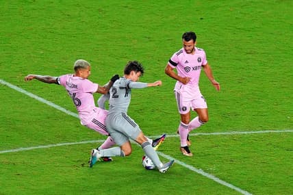 Feb 25, 2023; Fort Lauderdale, Florida, USA; Inter Miami CF midfielder Gregore (left) battles for the ball against CF Montreal midfielder Sean Rea (27) during the second half at DRV PNK Stadium. Mandatory Credit: John David Mercer-USA TODAY Sports