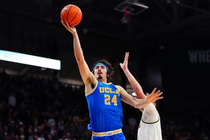 Feb 26, 2023; Boulder, Colorado, USA; UCLA Bruins guard Jaime Jaquez Jr. (24) shoots the ball past Colorado Buffaloes guard Luke O'Brien (0) in the second half at the CU Events Center. Mandatory Credit: Ron Chenoy-USA TODAY Sports