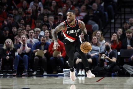 Feb 26, 2023; Portland, Oregon, USA; Portland Trail Blazers point guard Damian Lillard (0) dribbles the ball on a fast break during the first half against the Houston Rockets at Moda Center. Mandatory Credit: Soobum Im-USA TODAY Sports