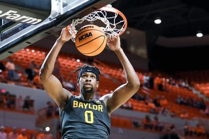 Baylor forward Flo Thamba (0) dunks the ball in the second half during a college basketball game between the Oklahoma State Cowboys (OSU) and the Baylor Bears at Gallagher-Iba Arena in Stillwater, Okla., Monday, Feb. 27, 2023.

Osu Vs Baylor