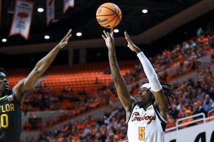 Oklahoma State guard Caleb Asberry (5) shoots for three in the second half during a college basketball game between the Oklahoma State Cowboys (OSU) and the Baylor Bears at Gallagher-Iba Arena in Stillwater, Okla., Monday, Feb. 27, 2023.

Osu Vs Baylor