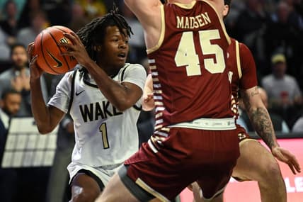 Feb 28, 2023; Winston-Salem, North Carolina, USA; Wake Forest Demon Deacons guard Tyree Appleby (1) controls the ball against Boston College Eagles guard Mason Madsen (45) during the first half at Lawrence Joel Veterans Memorial Coliseum. Mandatory Credit: William Howard-USA TODAY Sports