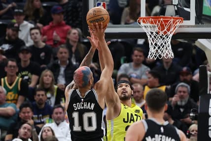 Feb 28, 2023; Salt Lake City, Utah, USA; San Antonio Spurs forward Jeremy Sochan (10) shoots over Utah Jazz guard Johnny Juzang (33) in the second half at Vivint Arena. Mandatory Credit: Rob Gray-USA TODAY Sports