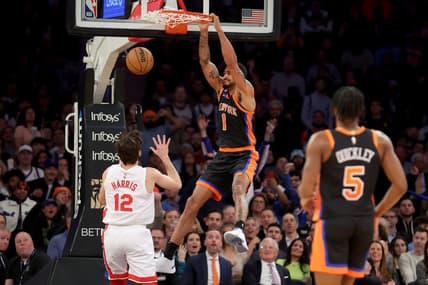 Mar 1, 2023; New York, New York, USA; New York Knicks forward Obi Toppin (1) dunks against Brooklyn Nets forward Joe Harris (12) during the second quarter at Madison Square Garden. Mandatory Credit: Brad Penner-USA TODAY Sports