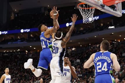 Mar 1, 2023; Milwaukee, Wisconsin, USA;  Milwaukee Bucks forward Giannis Antetokounmpo (34) shoots against Orlando Magic guard Markelle Fultz (20) during the second quarter at Fiserv Forum. Mandatory Credit: Jeff Hanisch-USA TODAY Sports