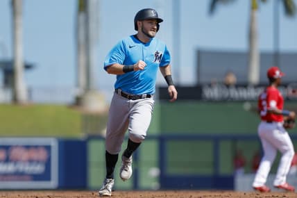 Mar 2, 2023; West Palm Beach, Florida, USA; Miami Marlins second baseman Garrett Hampson (1) runs toward third base during the second inning against the Washington Nationals at The Ballpark of the Palm Beaches. Mandatory Credit: Sam Navarro-USA TODAY Sports