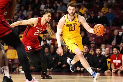 Mar 2, 2023; Minneapolis, Minnesota, USA; Minnesota Golden Gophers forward Jamison Battle (10) drives to the basket while Rutgers Scarlet Knights guard Caleb McConnell (22) defends during the first half at Williams Arena. Mandatory Credit: Matt Krohn-USA TODAY Sports
