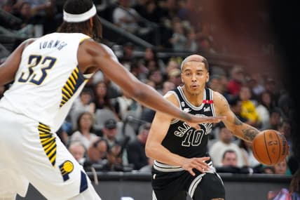 Mar 2, 2023; San Antonio, Texas, USA; San Antonio Spurs forward Jeremy Sochan (10) dribbles against Indiana Pacers center Myles Turner (33) in the second quarter at AT&T Center. Mandatory Credit: Dustin Safranek-USA TODAY Sports