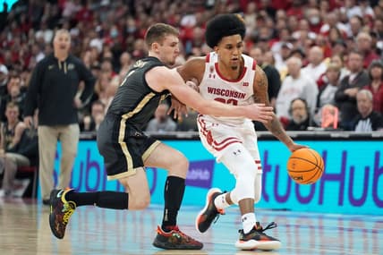 Mar 2, 2023; Madison, Wisconsin, USA; Purdue Boilermakers guard Braden Smith (3) fouls Wisconsin Badgers guard Chucky Hepburn (23) during the second half at the Kohl Center. Mandatory Credit: Kayla Wolf-USA TODAY Sports