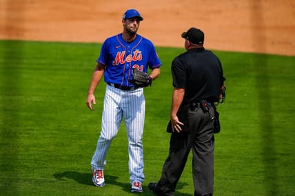 Mar 3, 2023; Port St. Lucie, Florida, USA; New York Mets starting pitcher Max Scherzer (21) speak to the umpire after being called for a balk on a quick pitch against the Washington Nationals during the second inning at Clover Park. Mandatory Credit: Rich Storry-USA TODAY Sports