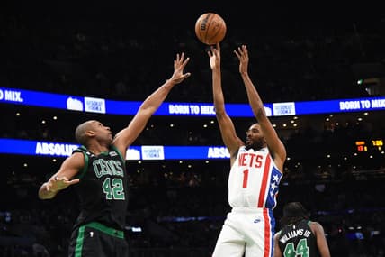 Mar 3, 2023; Boston, Massachusetts, USA;  Brooklyn Nets forward Mikal Bridges (1) shoots the ball against Boston Celtics center Al Horford (42) during the first half at TD Garden. Mandatory Credit: Bob DeChiara-USA TODAY Sports