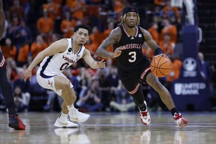 Mar 4, 2023; Charlottesville, Virginia, USA; Louisville Cardinals guard El Ellis (3) drives to the basket as Virginia Cavaliers guard Kihei Clark (0) defends in the first half at John Paul Jones Arena. Mandatory Credit: Geoff Burke-USA TODAY Sports