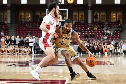 Mar 4, 2023; Chestnut Hill, Massachusetts, USA; Georgia Tech Yellow Jackets guard Kyle Sturdivant (1) drives to the basket against Boston College Eagles guard Jaeden Zackery (3) during the first half at the Conte Forum. Mandatory Credit: Brian Fluharty-USA TODAY Sports