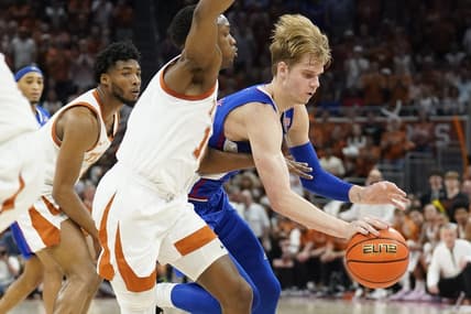 Feb 21, 2023; Austin, Texas, USA; Kansas Jayhawks guard Gradey Dick (4) drives to the basket against Texas Longhorns guard Sir'Jabari Rice (10) during the second half at Moody Center. Mandatory Credit: Scott Wachter-USA TODAY Sports