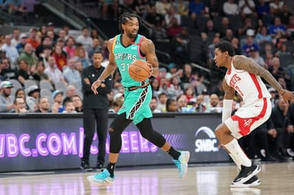 Mar 4, 2023; San Antonio, Texas, USA;  San Antonio Spurs forward Keita Bates-Diop dribbles up court during the first quarter of a game against the Houston Rockets at the AT&T Center. Mandatory Credit: Aaron Meullion-USA TODAY Sports