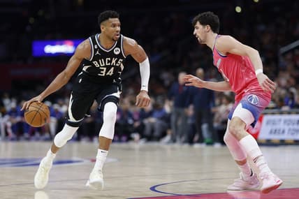Mar 5, 2023; Washington, District of Columbia, USA; Milwaukee Bucks forward Giannis Antetokounmpo (34) drives to the basket as Washington Wizards forward Corey Kispert (24) defends in the fourth quarter at Capital One Arena. Mandatory Credit: Geoff Burke-USA TODAY Sports