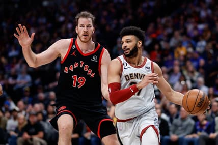 Mar 6, 2023; Denver, Colorado, USA; Denver Nuggets guard Jamal Murray (27) controls the ball ahead of Toronto Raptors center Jakob Poeltl (19) in the second quarter at Ball Arena. Mandatory Credit: Isaiah J. Downing-USA TODAY Sports