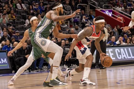 Mar 7, 2023; Detroit, Michigan, USA; Washington Wizards guard Bradley Beal (3) controls the ball in front of Detroit Pistons forward Marvin Bagley III (35) in the first quarter at Little Caesars Arena. Mandatory Credit: David Reginek-USA TODAY Sports