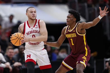Mar 8, 2023; Chicago, IL, USA; Nebraska Cornhuskers guard C.J. Wilcher (0) looks to pass the ball against Minnesota Golden Gophers forward Joshua Ola-Joseph (1) during the first half at United Center. Mandatory Credit: Kamil Krzaczynski-USA TODAY Sports