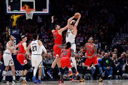 Mar 8, 2023; Denver, Colorado, USA; Denver Nuggets center Nikola Jokic (15) grabs a rebound against Chicago Bulls center Nikola Vucevic (9) as guard Patrick Beverley (21) and forward DeMar DeRozan (11) and guard Jamal Murray (27) and guard Alex Caruso (6) defend in the second quarter at Ball Arena. Mandatory Credit: Isaiah J. Downing-USA TODAY Sports